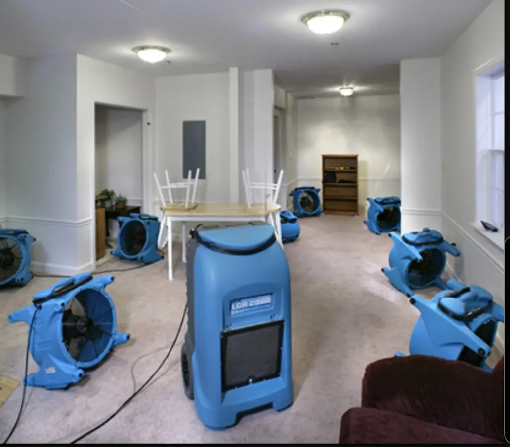 Air movers and dehumidifier setup for Water Damage Restoration in Marrero